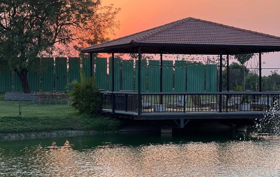 Lakeside deck and gazebo at Villaggio at sunset, set over Lake Togo